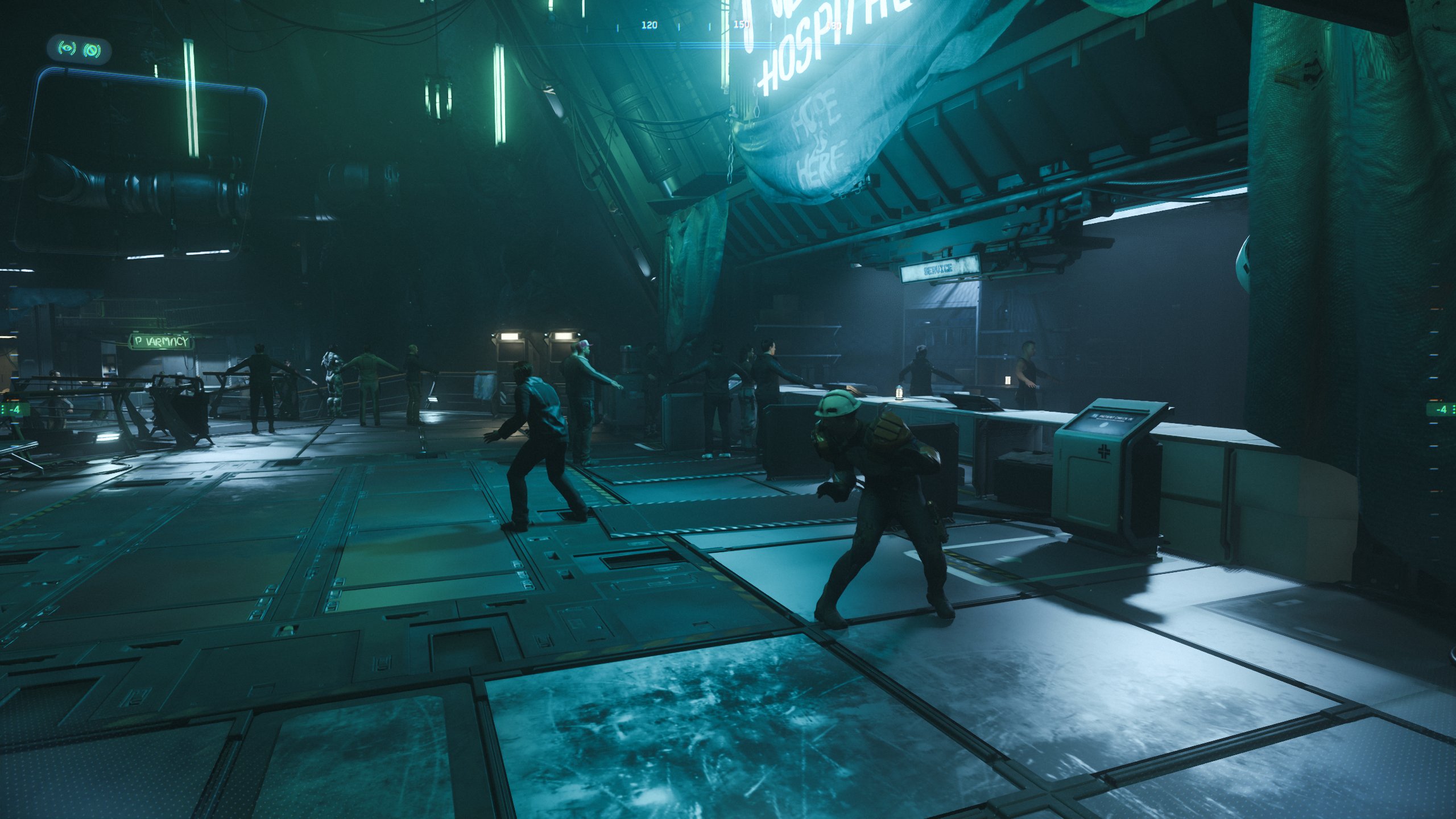 A figure moving quietly through a dim facility